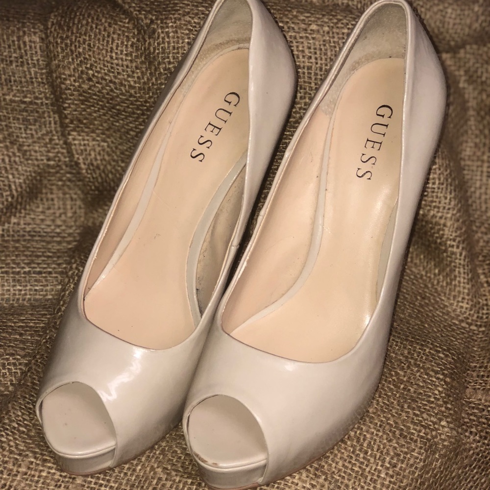 Peep toe guess beige heels.